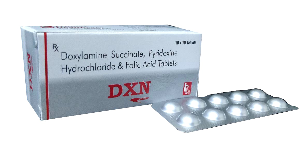 DXN Tablet (10x30) — Doxylamine Succinate 10 mg + Pyridoxine HCl 10 mg + Folic Acid from Trumac Healthcare PCD Pharma Franchise India